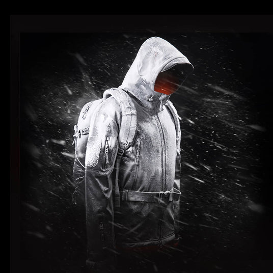 Person wearing a DEWBU 12V heated jacket in windy and snowy conditions for reliable warmth in cold environments